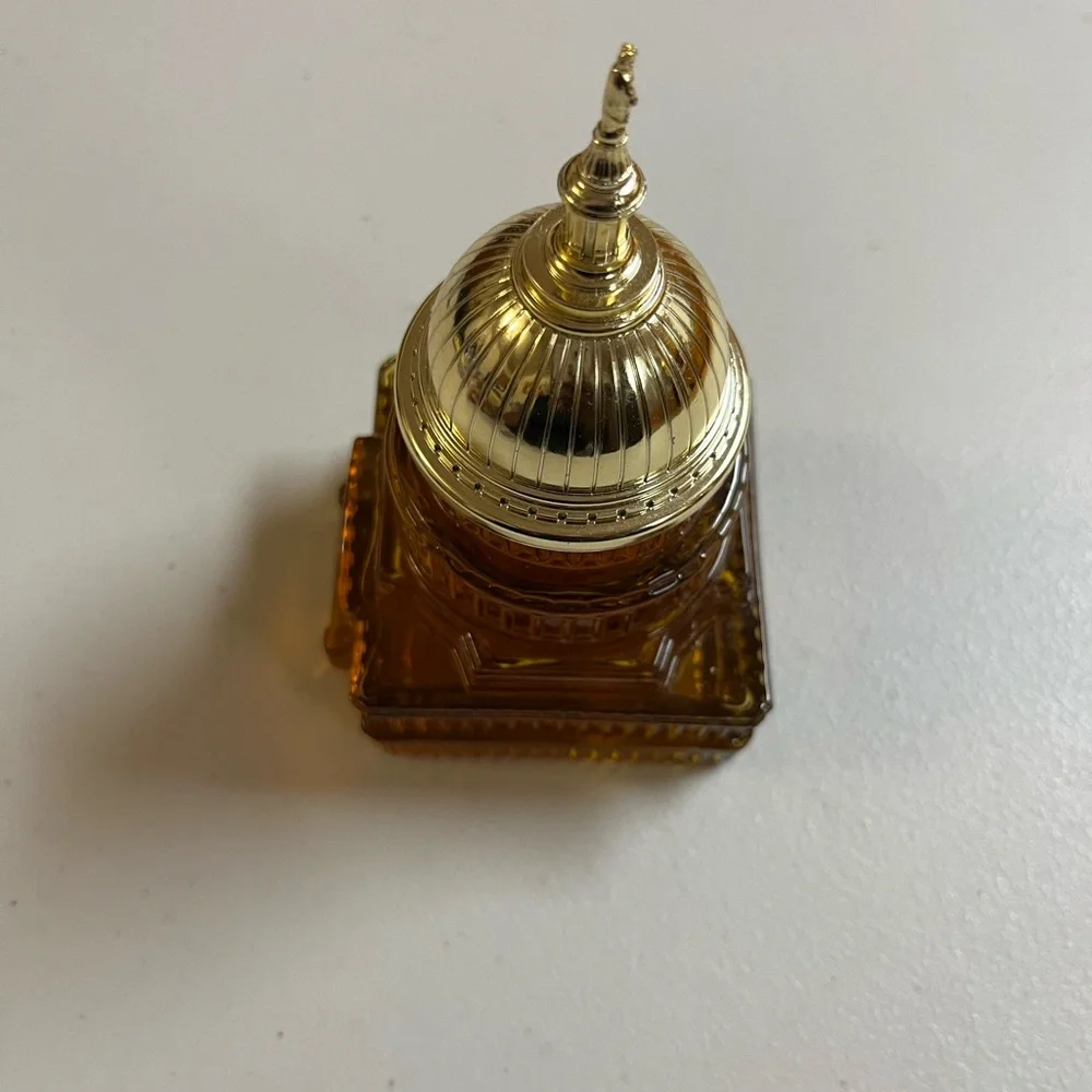 Vintage Avon Capitol Building Amber and Gold Cologne Bottle
